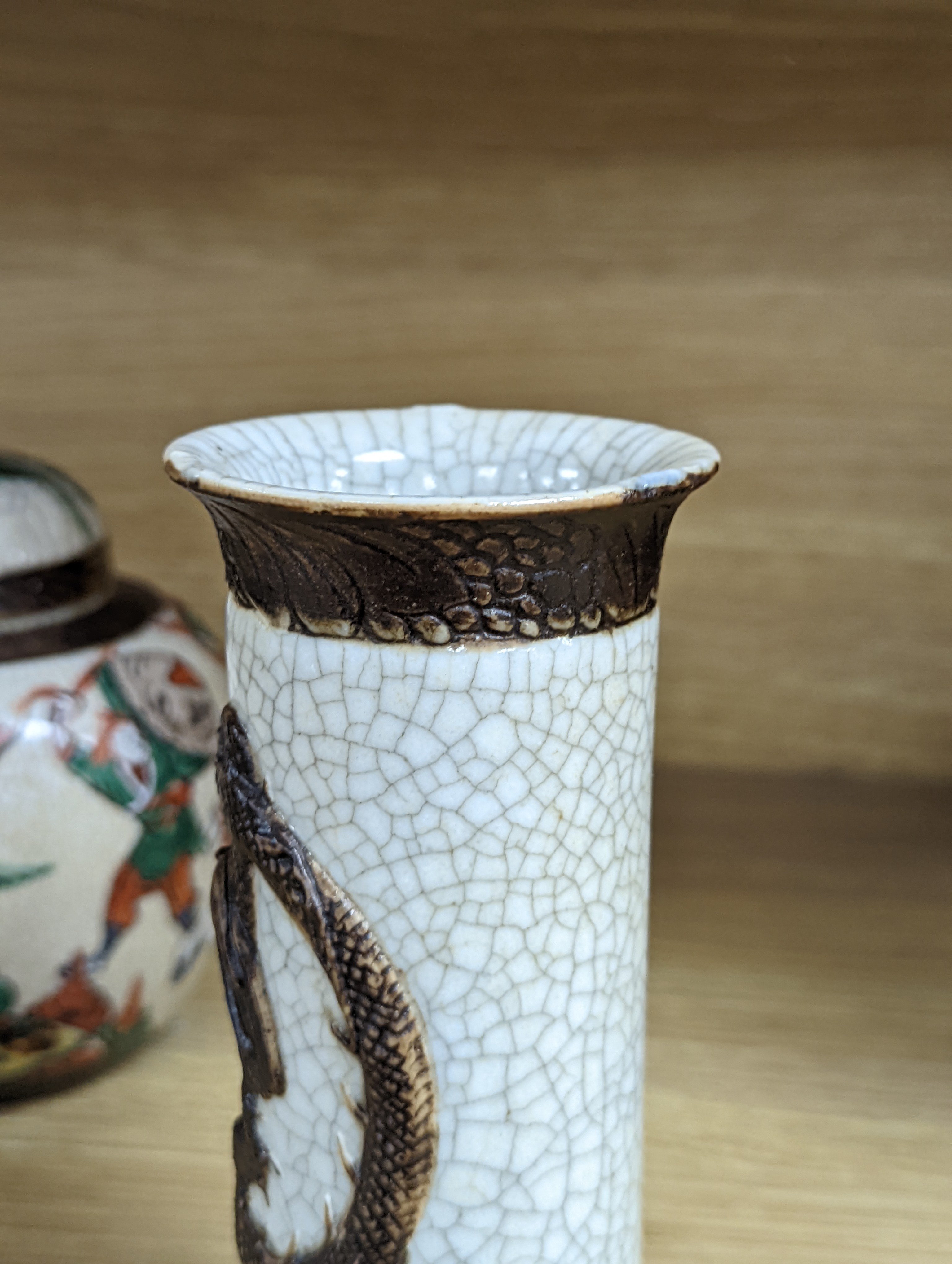 A Chinese famille verte crackle glaze jar and cover, 14.5cm, two famille rose dishes and a crackle glaze ‘dragon’ vase, all late 19th/early 20th century
